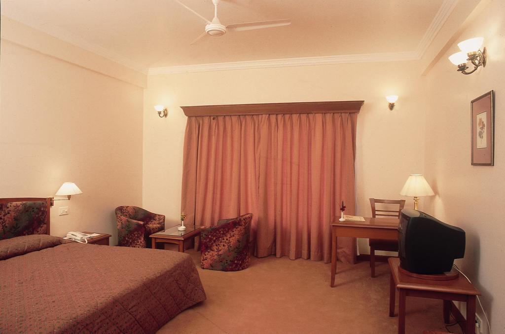 Hotel Express Residency-Jāmnagar Rum bild